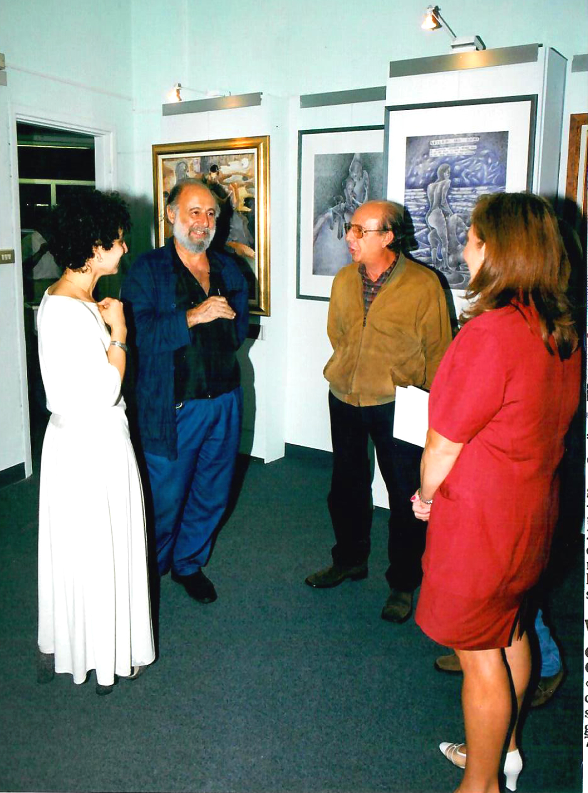 1999 - Personale, 'Dipinti, Cartoni, Sculture', nella foto Gladys Sica assiema a Togo, Libreria Dell'angolo, Milano